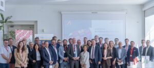 delegazione austriaca ed operatori dello scalo giuliano durante l'incontro alla Torre del Lloyd